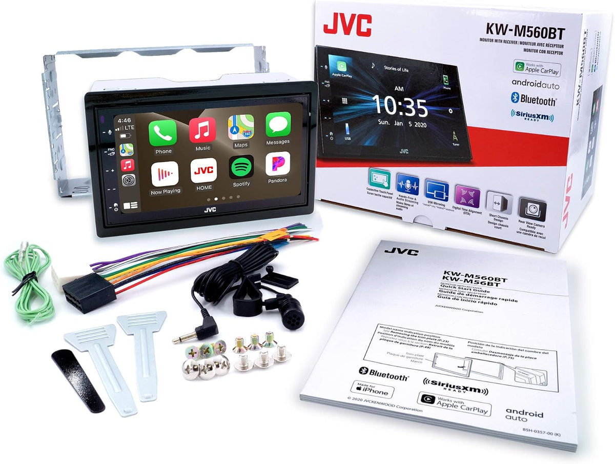 JVC car stereo system with packaging and accessories on a white background