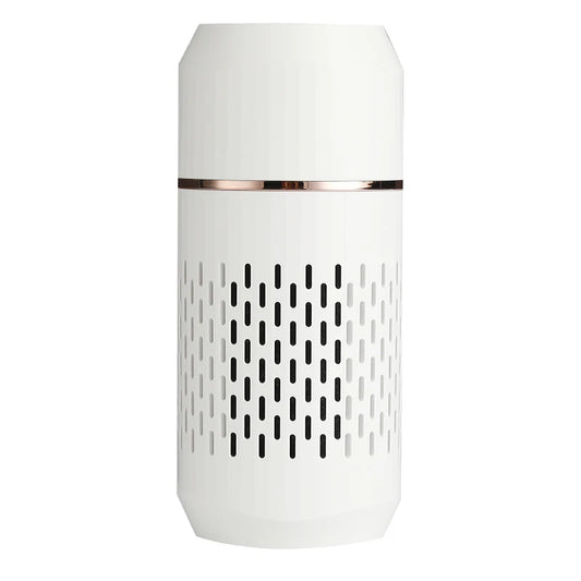A portable white air purifier with a cylindrical shape and a metallic band at the top.