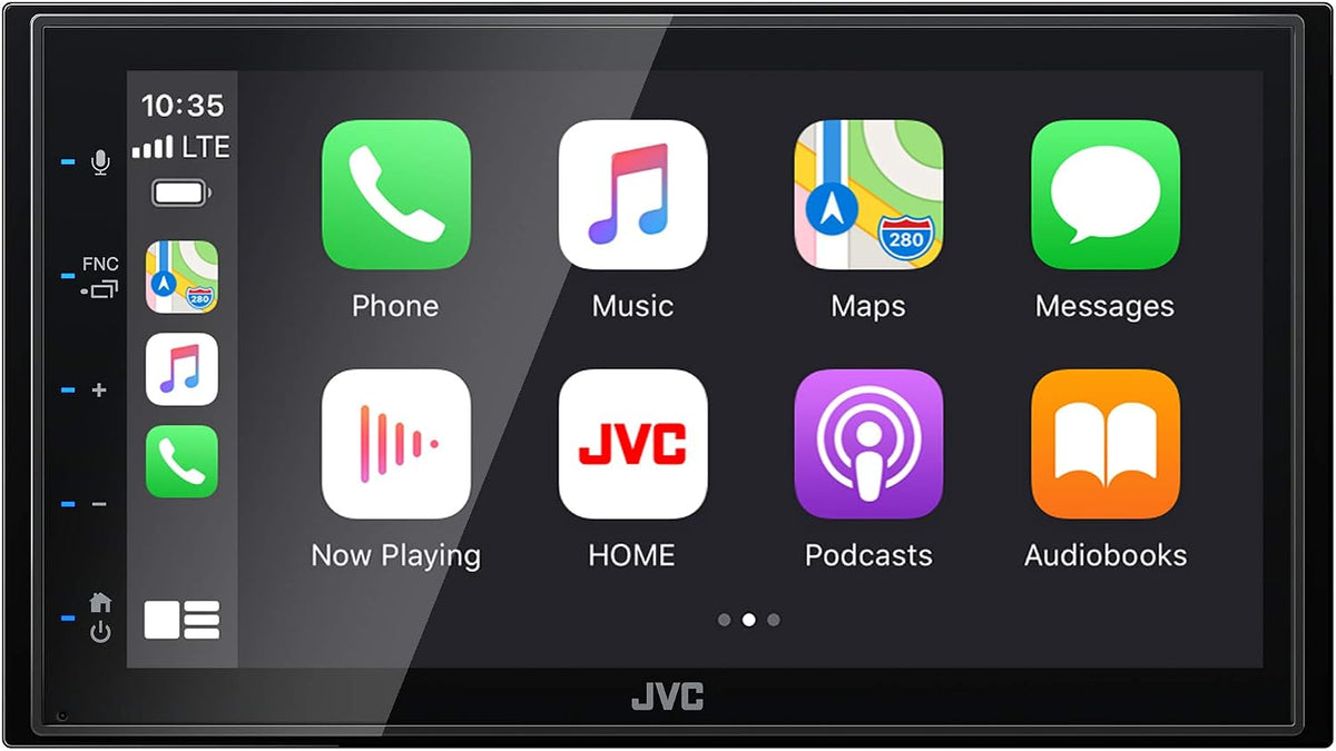 JVC car stereo head unit touchscreen display showing app icons including Phone, Music, Maps, Messages, Now Playing, Podcasts, and Audiobooks on a black interface.