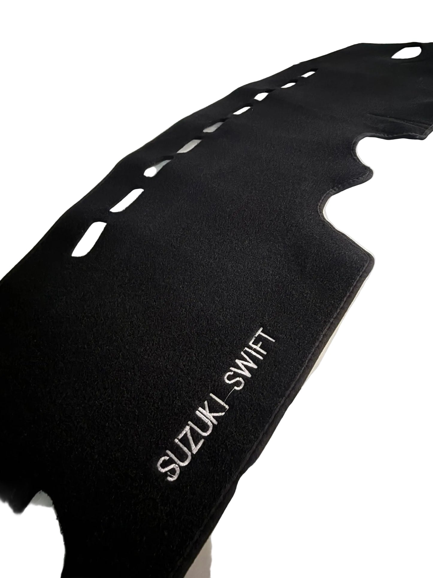 Black car mat with 'Suzuki Swift' branding on a white surface.