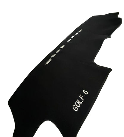 Black car mat with 'GOLF 6' text on a white surface