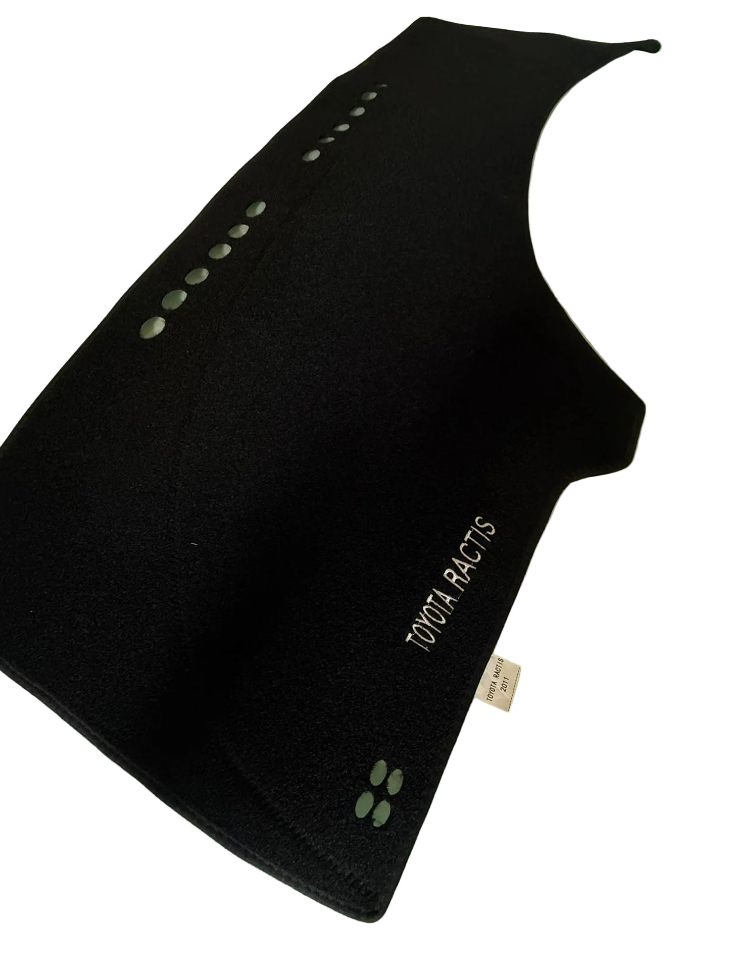 Black car mat with 'YOKOHAMA' branding on a light green surface