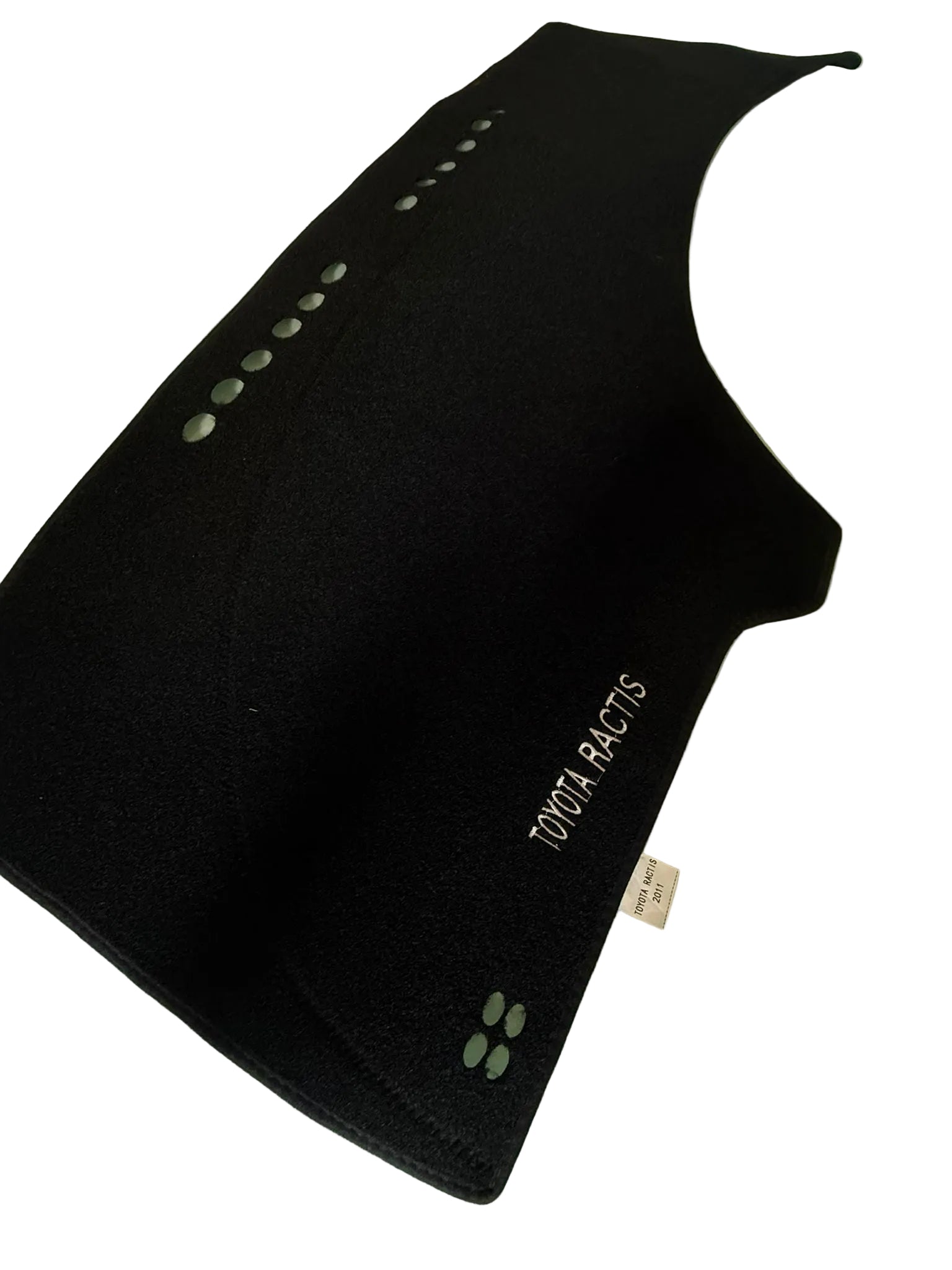 Black car mat with 'YOKOHAMA' branding on a light green surface