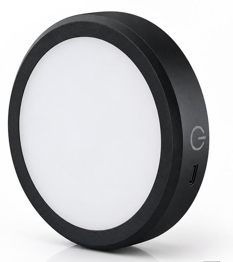 Black circular light with a power symbol on a white background
