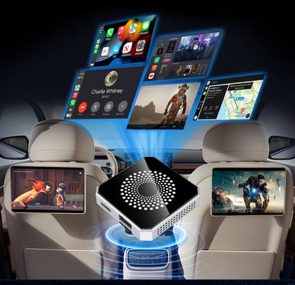 A car audio entertainment system shown installed in a vehicle interior, with a central black and white projector or receiver device emitting blue light between two front seats. Multiple in-car screens are displayed above and on the headrest screens, including media, navigation, and gaming interfaces.