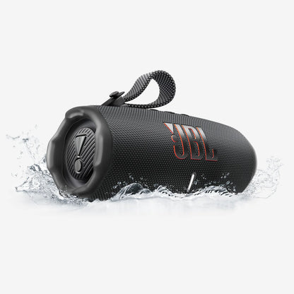 Black JBL speaker with water splashes on a white background